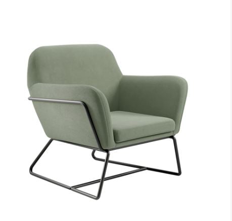 Green armchair with black metal frame on a white background