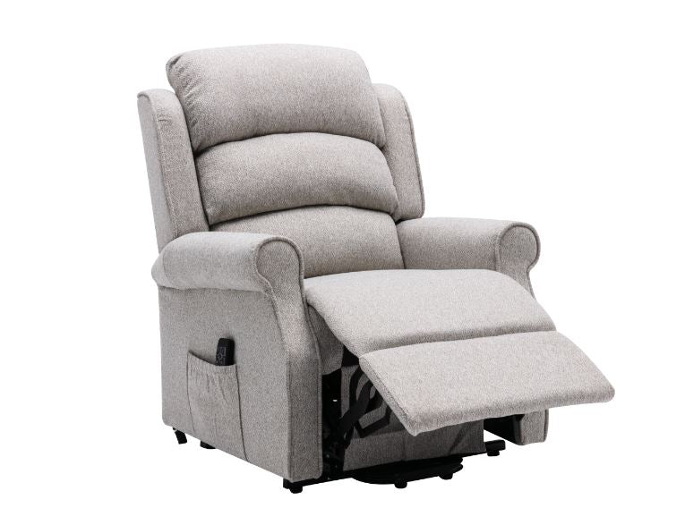 Beige recliner chair showing the footrest partly open