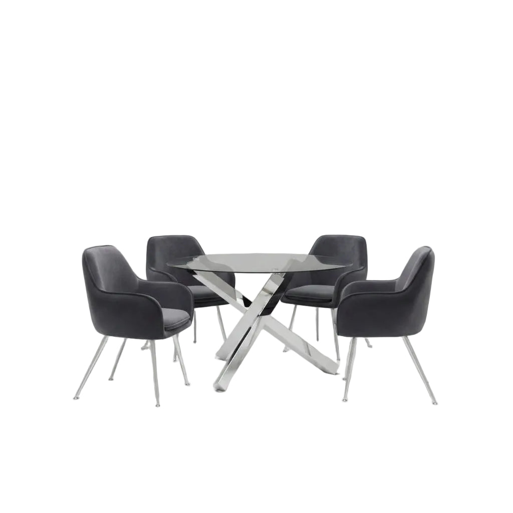 Modern dining room with black chairs and a glass table.