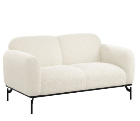 White sofa with black metal legs on a white background