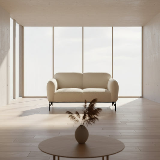 White sofa with black legs on a white background