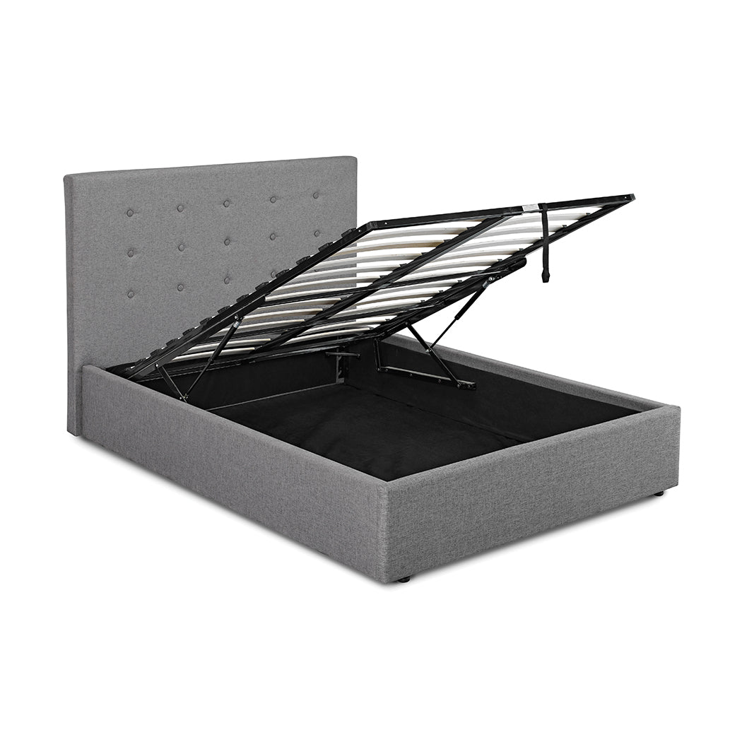 Grey upholstered bed with metal frame and storage compartment 