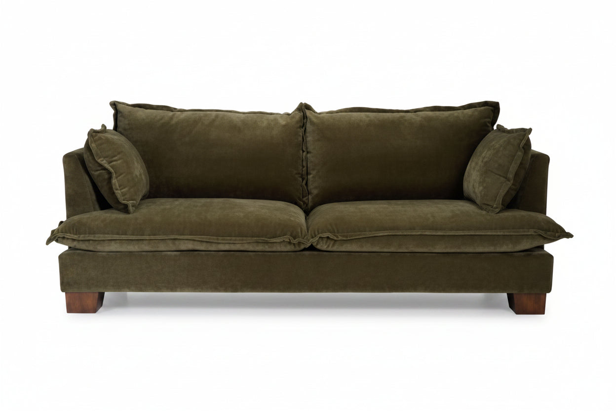 Olive Green sofa with cushions on a white background