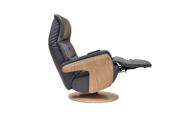 Swivel reclining chair in full charcoal leather showing the moving headrest
