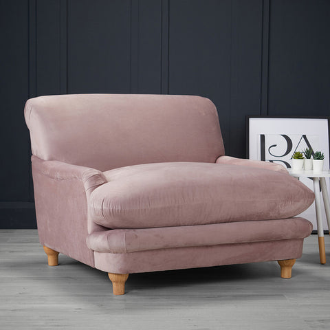 Comfortable easy chair in blush pink